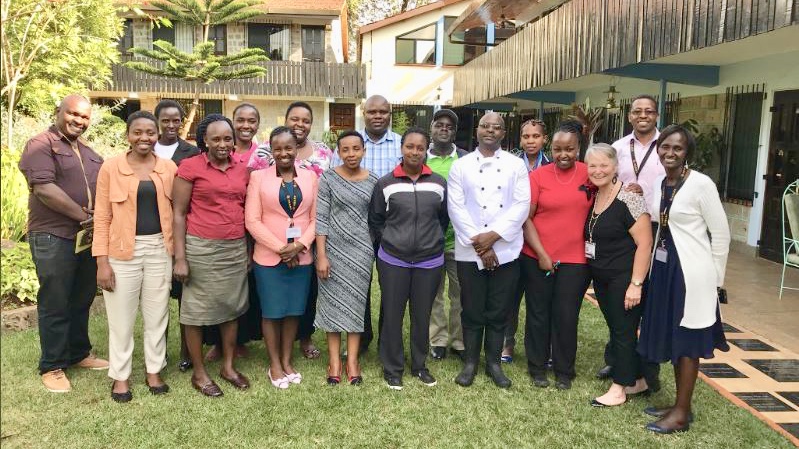 Nursing Professor Laura L. Van Auker in Kenya with members of an NGO