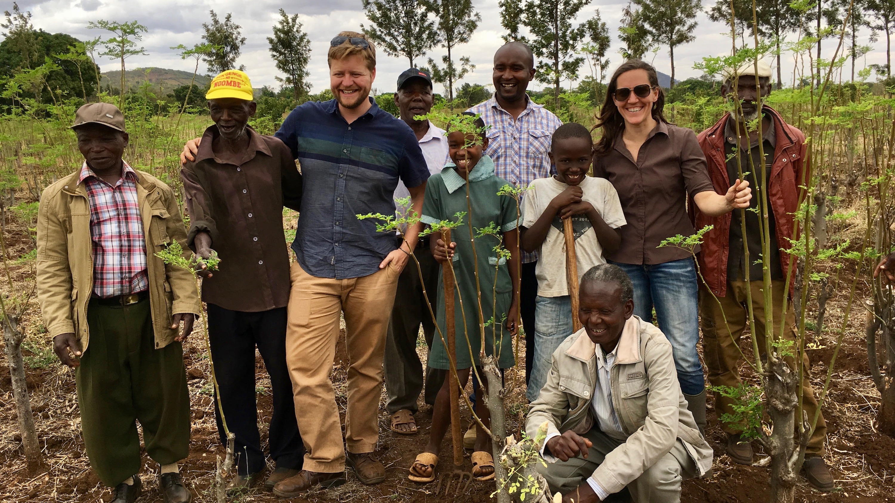 Peterson (third from left) and Waterman (second from right) conduct inga cost/benefit analysis with moringa farmers in Meru, Kenya.
