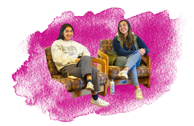 Two students sit in chairs over a pink water color background