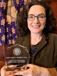 Katharine Burnett with award